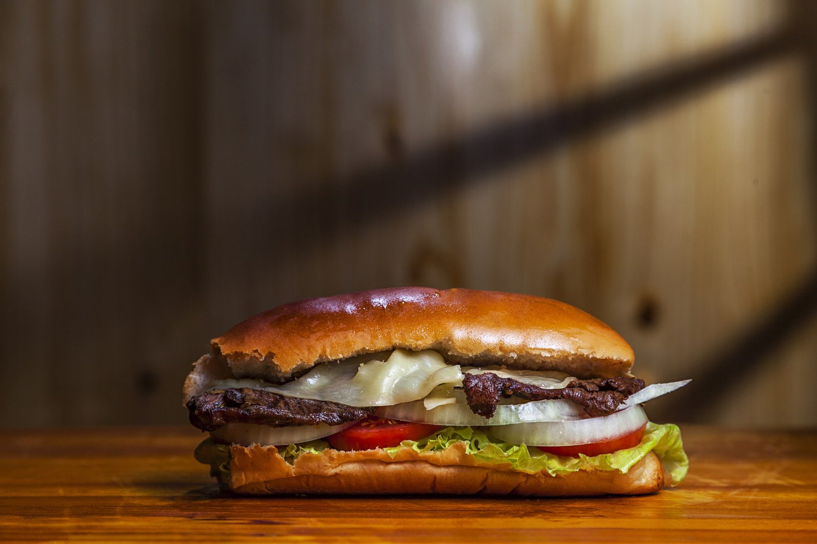closeup-shot-of-delicious-homemade-colombian-hamburger-on-the-table.jpg